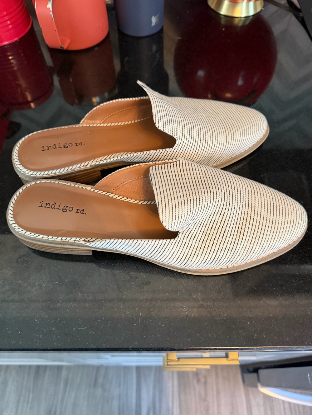 Indigo Women's Cream/Black Slip-On Loafers. Never worn. Size 10.